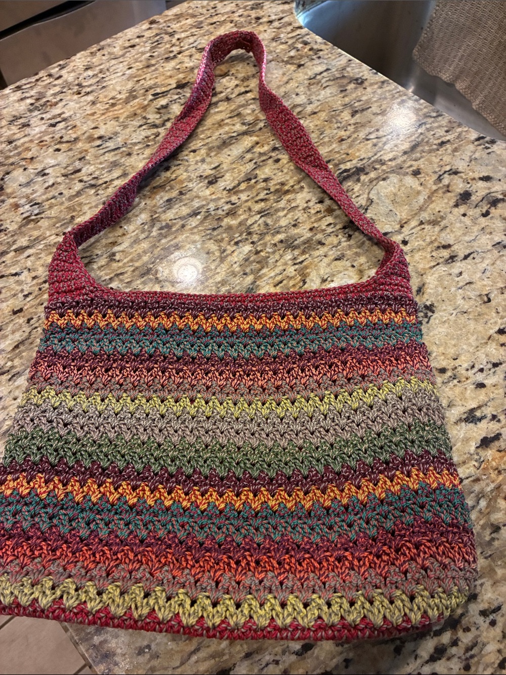 The Sak Multicolor Crochet Shoulder Bag with Red Strap
